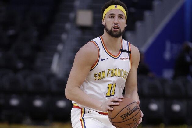 Golden State Warriors' Klay Thompson warms up prior to an NBA basketball game against the Denver Nuggets Thursday, Jan. 16, 2020, in San Francisco. (AP Photo/Ben Margot)