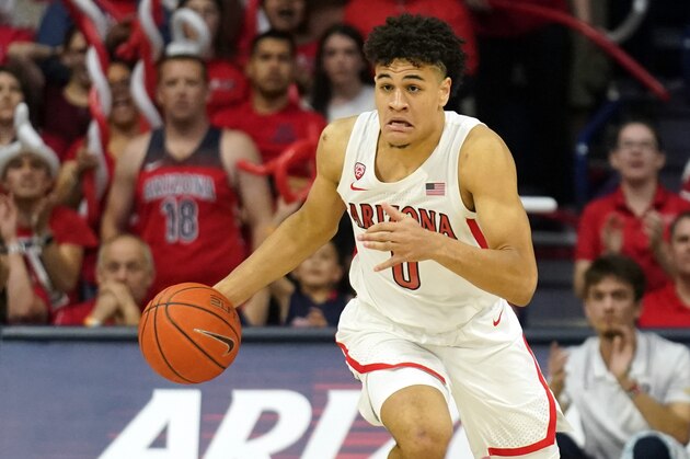 Arizona guard Josh Green (0) during the first half of an NCAA college basketball game against Washington Saturday, March 7, 2020, in Tucson, Ariz. (AP Photo/Rick Scuteri)