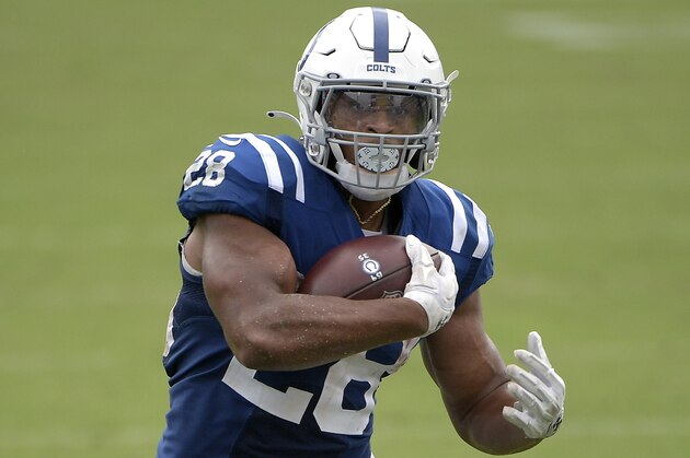 Indianapolis Colts running back Jonathan Taylor (28) rushes for yardage during the second half of an NFL football game against the Jacksonville Jaguars, Sunday, Sept. 13, 2020, in Jacksonville, Fla. (AP Photo/Phelan M. Ebenhack)