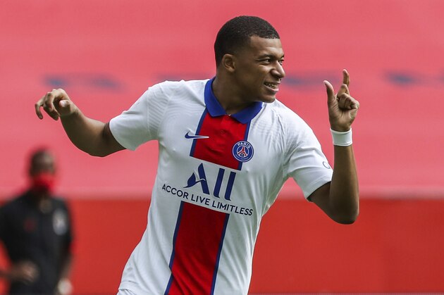 PSG's Kylian Mbappe gestures during the French League One soccer match between Nice and Paris Saint-Germain at the Allianz Riviera stadium in Nice, France, Sunday, September 20, 2020. (AP Photo/Daniel Cole)