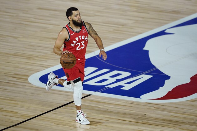 Toronto Raptors' Fred VanVleet (23) moves the ball up court against the Miami Heat during the first half of an NBA basketball game Monday, Aug. 3, 2020, in Lake Buena Vista, Fla. (AP Photo/Ashley Landis, Pool)