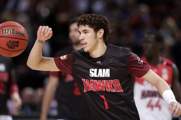 FILE - In this Nov. 17, 2019, file photo, LaMelo Ball of the Illawarra Hawks warms up before their game against the Sydney Kings in the Australian Basketball League in Sydney. LaMelo Ballâ€™s bid to be a club owner in Australia hasn't worked out. The American is expected to be a top pick in the upcoming NBA draft later this year.(AP Photo/Rick Rycroft, File)