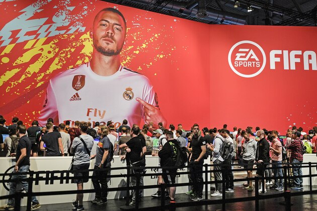Eden Hazard of Real Madrid promotes the latest FIFA 20 video game from EA Sports at the Gamescom in Cologne, Germany, Tuesday, Aug. 20, 2019. Hundreds of thousands will check out the latest video games this week at the biggest event in the gaming industry. (AP Photo/Martin Meissner)
