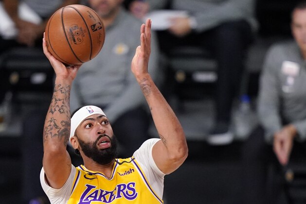 Los Angeles Lakers' Anthony Davis (3) shoots against the Denver Nuggets during the first half of an NBA conference final playoff basketball game Thursday, Sept. 24, 2020, in Lake Buena Vista, Fla. (AP Photo/Mark J. Terrill)