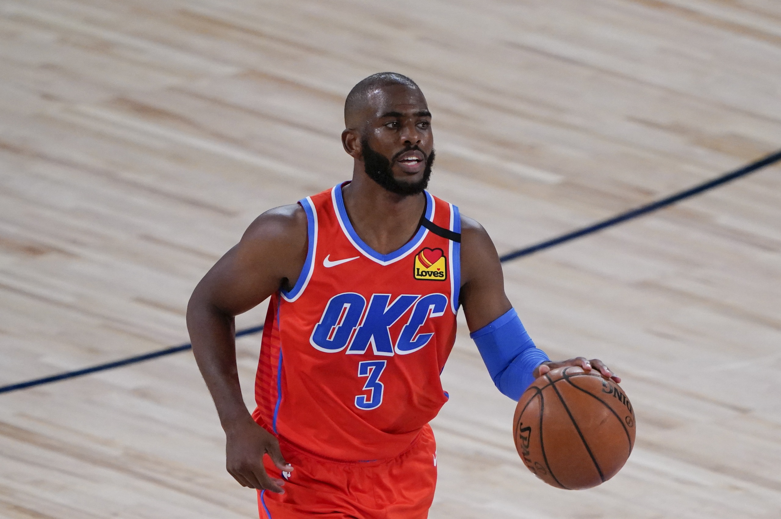 Oklahoma City Thunder's Chris Paul (3) makes his way down the court during an NBA basketball game against Utah Jazz Saturday, Aug. 1, 2020, in Lake Buena Vista, Fla. (AP Photo/Ashley Landis, Pool)