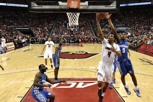 FILE - In this Wednesday, Dec. 21, 2016, file photo, Louisville's Quentin Snider (4) goes in for a layup past Kentucky's Malik Monk (5) during an NCAA college basketball game in Louisville, Ky. Defense has not been a problem for Louisville. Rarely is under coach Rick Pitino. The questions for the Cardinals this season have come on the offensive end. They answered a few against No. 6 Kentucky. (AP Photo/Timothy D. Easley, File)