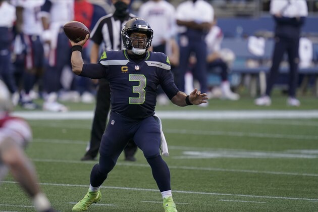Seattle Seahawks quarterback Russell Wilson in action against the New England Patriots during an NFL football game, Sunday, Sept. 20, 2020, in Seattle. (AP Photo/Elaine Thompson)