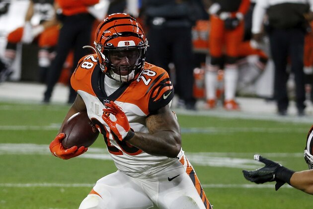 Cincinnati Bengals running back Joe Mixon (28) runs with the ball during an NFL football game against the Cleveland Browns, Thursday, Sept. 17, 2020, in Cleveland. (AP Photo/Kirk Irwin)