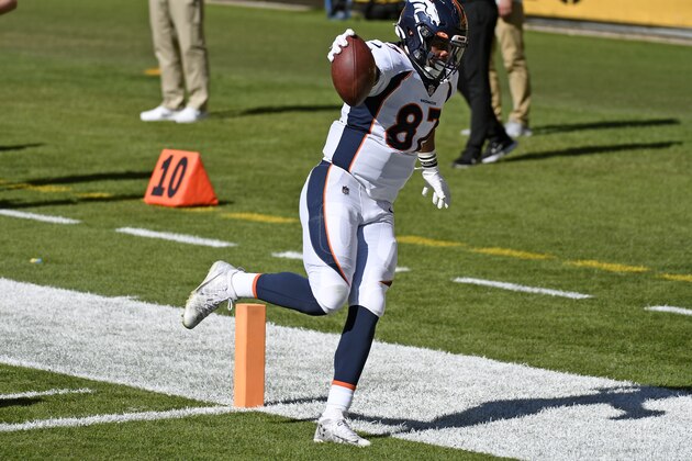 Denver Broncos tight end Noah Fant (87) scores after taking a pass from quarterback Jeff Driskel during the second half of an NFL football game in Pittsburgh, Sunday, Sept. 20, 2020. (AP Photo/Don Wright) Denver Broncos tight end Noah Fant (87) scores after taking a pass from quarterback Jeff Driskel during the second half of an NFL football game in Pittsburgh, Sunday, Sept. 20, 2020. (AP Photo/Don Wright)