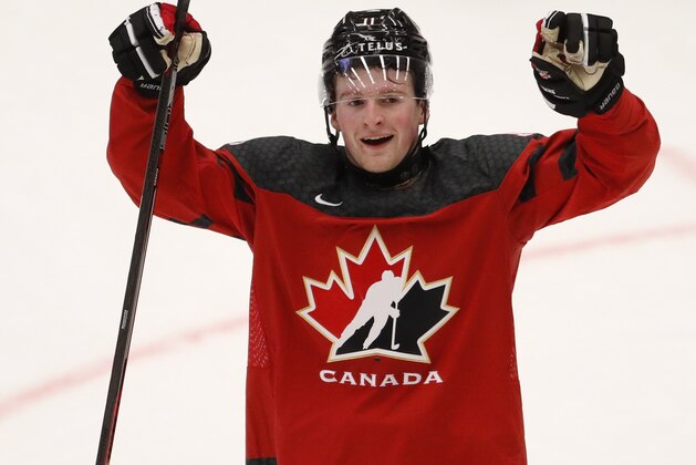 Canada's Alexis Lafreniere celebrates his sides first goal during the U20 Ice Hockey Worlds match between Canada and the United States in Ostrava, Czech Republic, Thursday, Dec. 26, 2019. (AP Photo/Petr David Josek) Canada's Alexis Lafreniere celebrates his sides first goal during the U20 Ice Hockey Worlds match between Canada and the United States in Ostrava, Czech Republic, Thursday, Dec. 26, 2019. (AP Photo/Petr David Josek)