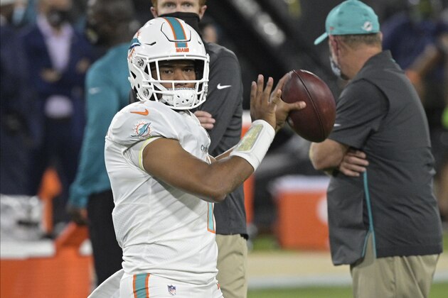Miami Dolphins quarterback Tua Tagovailoa warms up before an NFL football game against the Miami Dolphins, Thursday, Sept. 24, 2020, in Jacksonville, Fla. (AP Photo/Phelan M. Ebenhack) Miami Dolphins quarterback Tua Tagovailoa warms up before an NFL football game against the Miami Dolphins, Thursday, Sept. 24, 2020, in Jacksonville, Fla. (AP Photo/Phelan M. Ebenhack)