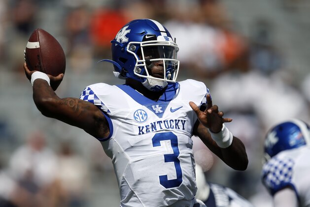 Kentucky quarterback Terry Wilson (3) throws a pass against Auburn during the first quarter of an NCAA college football game on Saturday, Sept. 26, 2020 in Auburn, Ala. (AP Photo/Butch Dill)