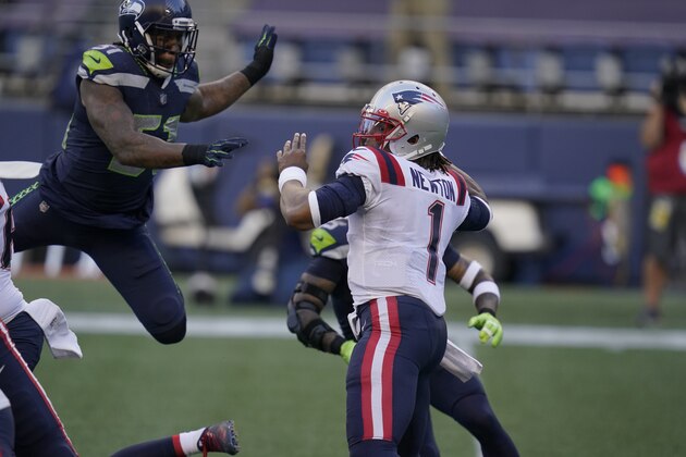 Seattle Seahawks linebacker Bruce Irvin, left, pressures New England Patriots quarterback Cam Newton (1) during the first half of an NFL football game, Sunday, Sept. 20, 2020, in Seattle. (AP Photo/Elaine Thompson) Seattle Seahawks linebacker Bruce Irvin, left, pressures New England Patriots quarterback Cam Newton (1) during the first half of an NFL football game, Sunday, Sept. 20, 2020, in Seattle. (AP Photo/Elaine Thompson)