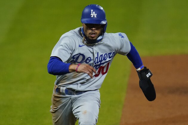 Los Angeles Dodgers right fielder Mookie Betts (50) in the seventh inning of a baseball game Saturday, Sept. 19, 2020, in Denver. (AP Photo/David Zalubowski)