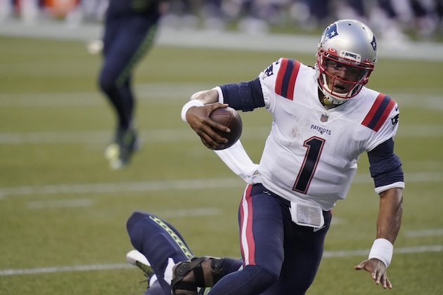 New England Patriots quarterback Cam Newton (1) is sacked by Seattle Seahawks strong safety Jamal Adams during the second half of an NFL football game, Sunday, Sept. 20, 2020, in Seattle. (AP Photo/Elaine Thompson)