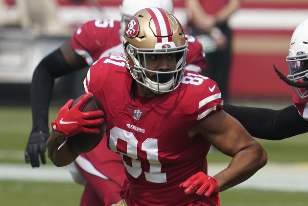 San Francisco 49ers tight end Jordan Reed (81) runs against Arizona Cardinals outside linebacker De'Vondre Campbell during the first half of an NFL football game in Santa Clara, Calif., Sunday, Sept. 13, 2020. (AP Photo/Tony Avelar)