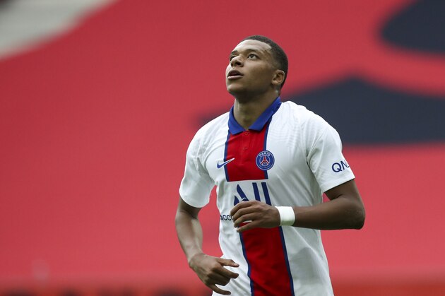PSG's Kylian Mbappe reacts during the French League One soccer match between Nice and Paris Saint-Germain at the Allianz Riviera stadium in Nice, France, Sunday, September 20, 2020. (AP Photo/Daniel Cole)