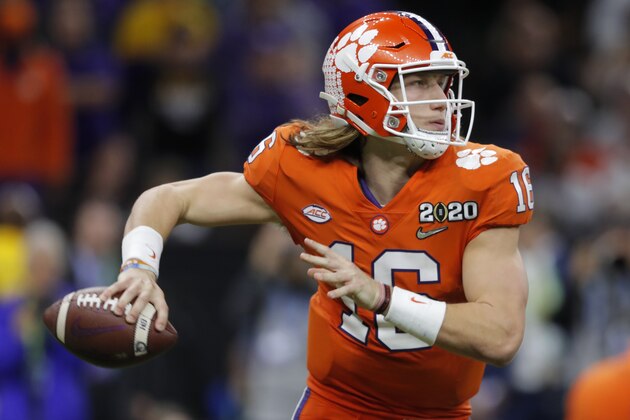 FILE - In this Jan. 13, 2020, file photo, Clemson quarterback Trevor Lawrence passes against LSU during the second half of a NCAA College Football Playoff national championship game, in New Orleans. Clemson is preseason No. 1 in The Associated Press Top 25, Monday, Aug. 24, 2020, a poll featuring nine Big Ten and Pac-12 teams that gives a glimpse at whatâ€™s already been taken from an uncertain college football fall by the pandemic. (AP Photo/Gerald Herbert, File)