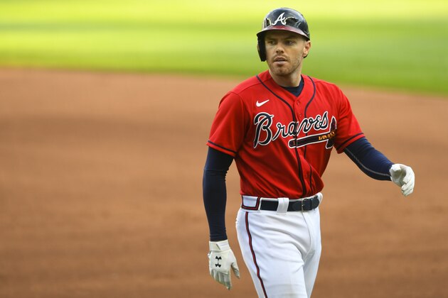 Atlanta Braves' Freddie Freeman walks to the dugout during a baseball game against the Boston Red Sox, Sunday, Sept. 27, 2020, in Atlanta. (AP Photo/John Amis)