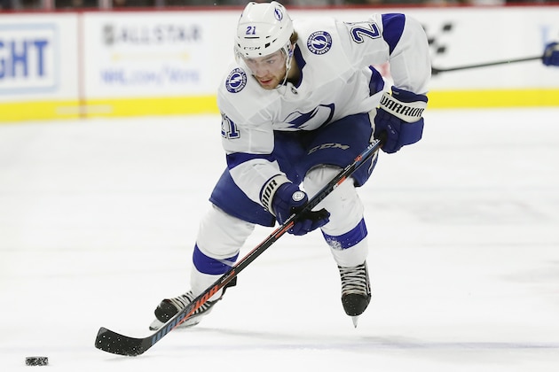 Tampa Bay Lightning center Brayden Point (21) skates against the Carolina Hurricanes during the first period of an NHL hockey game in Raleigh, N.C., Sunday, Jan. 5, 2020. (AP Photo/Gerry Broome)