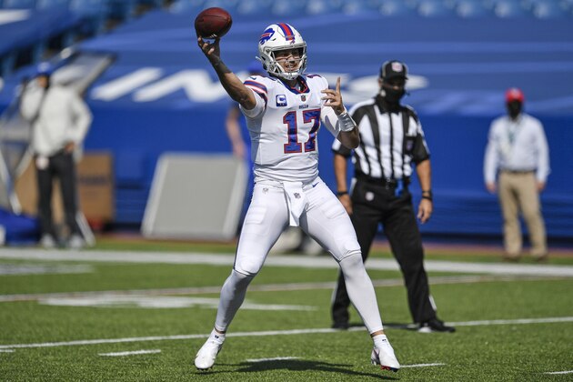 Buffalo Bills quarterback Josh Allen (17) throws a pass to Lee Smith (85) for a touchdown during the first half of an NFL football game against the Los Angeles Rams Sunday, Sept. 27, 2020, in Orchard Park, N.Y. (AP Photo/Adrian Kraus)