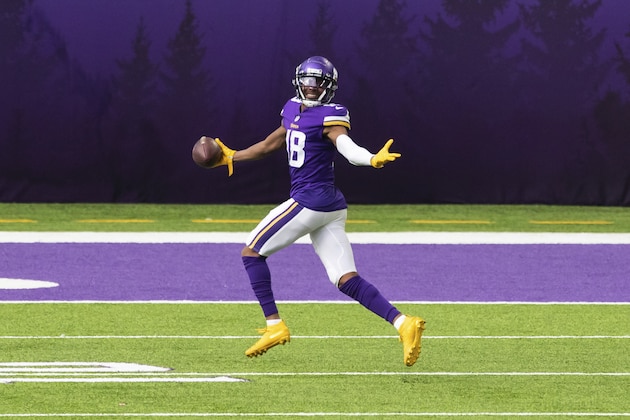 Minnesota Vikings wide receiver Justin Jefferson (18) celebrates after catching a touchdown pass in the third quarter during an NFL football game against the Tennessee Titans, Sunday, Sept. 27, 2020, in Minneapolis. The Titans defeated the Vikings 31-20. (AP Photo/David Berding)