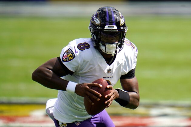Baltimore Ravens quarterback Lamar Jackson scrambles against the Cleveland Browns during the first half of an NFL football game, Sunday, Sept. 13, 2020, in Baltimore. (AP Photo/Julio Cortez)