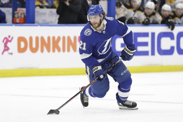 Tampa Bay Lightning center Brayden Point (21) against the Boston Bruins during the second period of an NHL hockey game Tuesday, March 3, 2020, in Tampa, Fla. (AP Photo/Chris O'Meara)