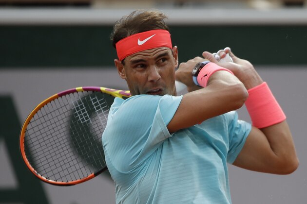 Spain's Rafael Nadal plays a shot against Egor Gerasimov of Belarus in the first round match of the French Open tennis tournament at the Roland Garros stadium in Paris, France, Monday, Sept. 28, 2020. (AP Photo/Alessandra Tarantino)