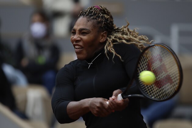 Serena Williams of the U.S. plays a shot against Kristie Ahn of the U.S. in the first round match of the French Open tennis tournament at the Roland Garros stadium in Paris, France, Monday, Sept. 28, 2020. (AP Photo/Alessandra Tarantino)