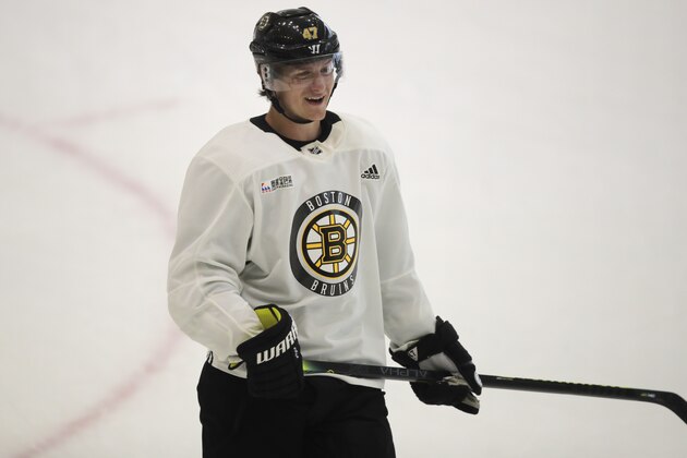 Boston Bruins defenseman Torey Krug smiles at the NHL hockey team's camp on Tuesday, July 14, 2020, in Boston. (AP Photo/Charles Krupa)