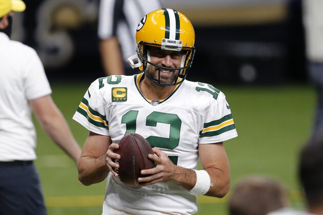 Green Bay Packers quarterback Aaron Rodgers (12) warms up before an NFL football game against the New Orleans Saints in New Orleans, Sunday, Sept. 27, 2020. (AP Photo/Brett Duke)