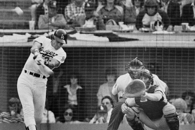Los Angeles Dodgers batter Jay Johnstone, left, follows on his two-run homer in the sixth inning off New York relief pitcher Ron Davis in the World Series in Los Angeles, Oct. 24, 1981. Looking on are Yankees catcher Rick Cerone and home plate umpire Doug Harvey. The homer tied the game for the Dodgers. (AP Photo) Los Angeles Dodgers batter Jay Johnstone, left, follows on his two-run homer in the sixth inning off New York relief pitcher Ron Davis in the World Series in Los Angeles, Oct. 24, 1981. Looking on are Yankees catcher Rick Cerone and home plate umpire Doug Harvey. The homer tied the game for the Dodgers. (AP Photo)