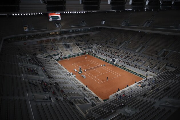 View of center court Philippe Chatrier as Austria's Dominic Thiem plays Croatia's Marin Cilic in the first round match of the French Open tennis tournament at the Roland Garros stadium in Paris, France, Monday, Sept. 28, 2020. (AP Photo/Alessandra Tarantino) View of center court Philippe Chatrier as Austria's Dominic Thiem plays Croatia's Marin Cilic in the first round match of the French Open tennis tournament at the Roland Garros stadium in Paris, France, Monday, Sept. 28, 2020. (AP Photo/Alessandra Tarantino)