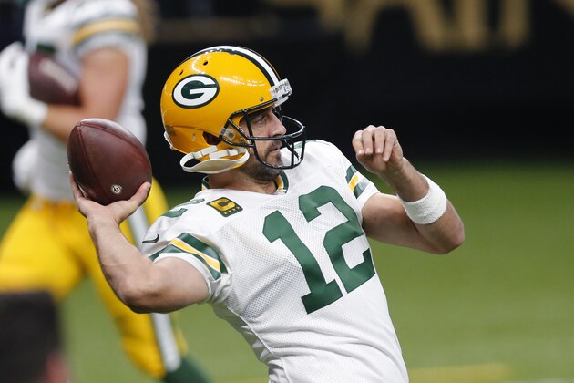 Green Bay Packers quarterback Aaron Rodgers (12) warms up before an NFL football game against the New Orleans Saints in New Orleans, Sunday, Sept. 27, 2020. (AP Photo/Brett Duke)