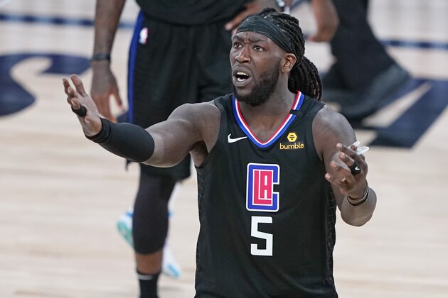 Los Angeles Clippers' Montrezl Harrell (5) reacts to a call during the second half of an NBA basketball game against the Dallas Mavericks Wednesday, Aug. 19, 2020, in Lake Buena Vista, Fla. Dallas won 127-114. (AP Photo/Ashley Landis, Pool)