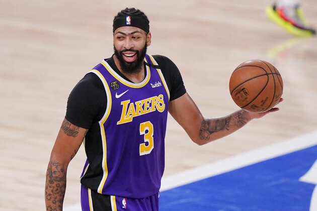 Los Angeles Lakers' Anthony Davis (3) celebrates after the Lakers beat the Denver Nuggets in an NBA conference final playoff basketball game Saturday, Sept. 26, 2020, in Lake Buena Vista, Fla. The Lakers won 117-107 to win the series 4-1. (AP Photo/Mark J. Terrill)