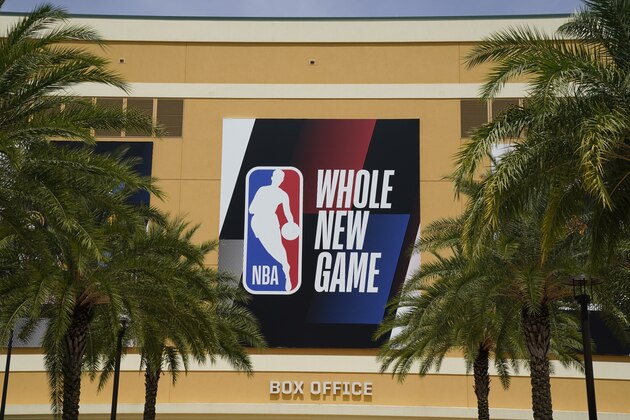 An NBA logo is displayed outside a basketball arena Friday, Aug. 28, 2020, in Lake Buena Vista, Fla. (AP Photo/Ashley Landis, Pool) An NBA logo is displayed outside a basketball arena Friday, Aug. 28, 2020, in Lake Buena Vista, Fla. (AP Photo/Ashley Landis, Pool)