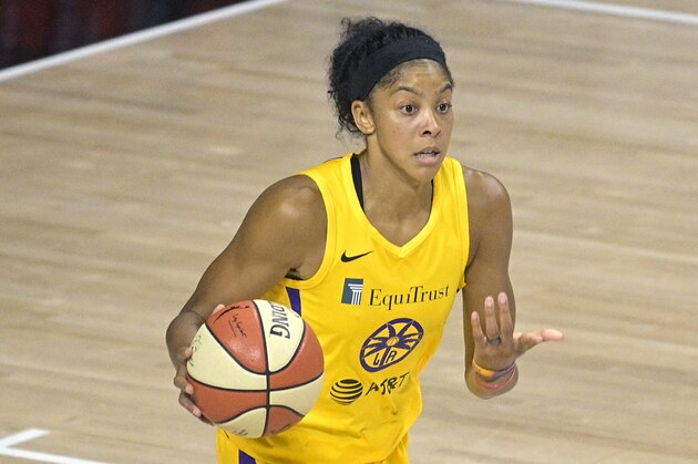 Los Angeles Sparks forward Candace Parker brings the ball up the court during the second half of a WNBA basketball game against the Washington Mystics, Thursday, Sept. 10, 2020, in Bradenton, Fla. (AP Photo/Phelan M. Ebenhack)