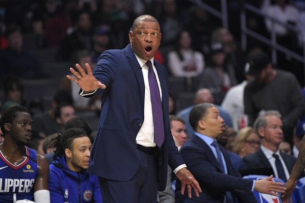 Los Angeles Clippers head coach Doc Rivers gestures during the first half of an NBA basketball game against the Philadelphia 76ers Sunday, March 1, 2020, in Los Angeles. (AP Photo/Mark J. Terrill)