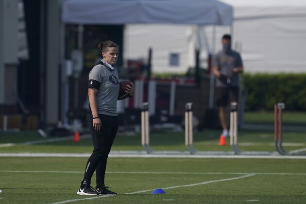 San Francisco 49ers assistant coach Katie Sowers during NFL football practice in Santa Clara, Calif., Saturday, Aug. 22, 2020. (AP Photo/Jeff Chiu, Pool)