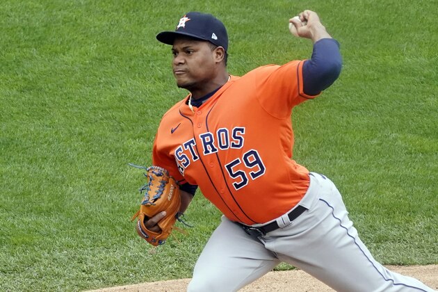 Houston Astros reliever pitcher Framber Valdez throws in the fifth inning against the Minnesota Twins  in Game 1 of an American League wild-card baseball series, Tuesday Sept. 29, 2020, in Minneapolis. (AP Photo/Jim Mone)