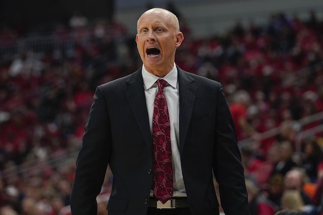 Louisville head coach Chris Mack reacts to a play during the second half of an NCAA college basketball game against Virginia Tech, Sunday, March 1, 2020 in Louisville, Ky. (AP Photo/Bryan Woolston)
