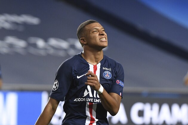 PSG's Kylian Mbappe reacts after missing an opportunity to score during the Champions League semifinal soccer match between RB Leipzig and Paris Saint-Germain at the Luz stadium in Lisbon, Portugal, Tuesday, Aug. 18, 2020. (David Ramos/Pool Photo via AP) PSG's Kylian Mbappe reacts after missing an opportunity to score during the Champions League semifinal soccer match between RB Leipzig and Paris Saint-Germain at the Luz stadium in Lisbon, Portugal, Tuesday, Aug. 18, 2020. (David Ramos/Pool Photo via AP)