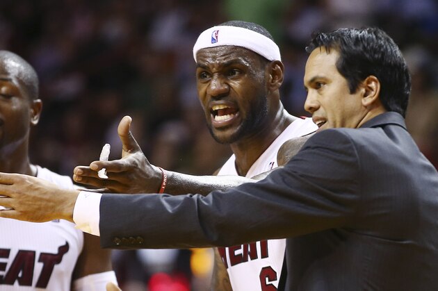 Miami Heat coach Erik Spoelstra, right, and LeBron James protest a loose ball foul called against James during the second half of an NBA basketball game against the Los Angeles Clippers in Miami, Thursday, Nov. 7, 2013. The Heat won 102-97. (AP Photo/J Pat Carter)