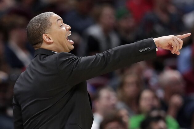 FILE - In this Oct. 6, 2018, file photo, Cleveland Cavaliers head coach Tyronn Lue yells instructions to players in the second half of an NBA preseason basketball game against the Boston Celtics, in Cleveland.  Lue feels re-energized after he was sidelined by health issues last season. Lue battled anxiety and insomnia during a drama-filled season that ended with the Cavs being swept in the Finals by Golden State A longtime assistant, Lue’s embracing the chance to mold young players and perhaps show that he had something to do with Cleveland’s dominance the past few seasons.(AP Photo/Tony Dejak, File)