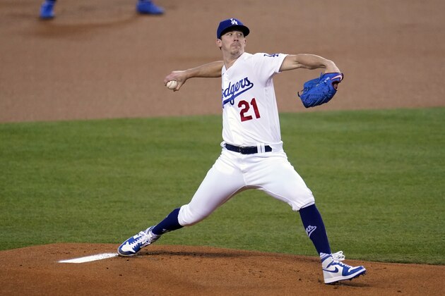 Los Angeles Dodgers starter Walker Buehler winds up during the first inning of the team's baseball game against the Oakland Athletics on Thursday, Sept. 24, 2020, in Los Angeles. (AP Photo/Marcio Jose Sanchez) Los Angeles Dodgers starter Walker Buehler winds up during the first inning of the team's baseball game against the Oakland Athletics on Thursday, Sept. 24, 2020, in Los Angeles. (AP Photo/Marcio Jose Sanchez)