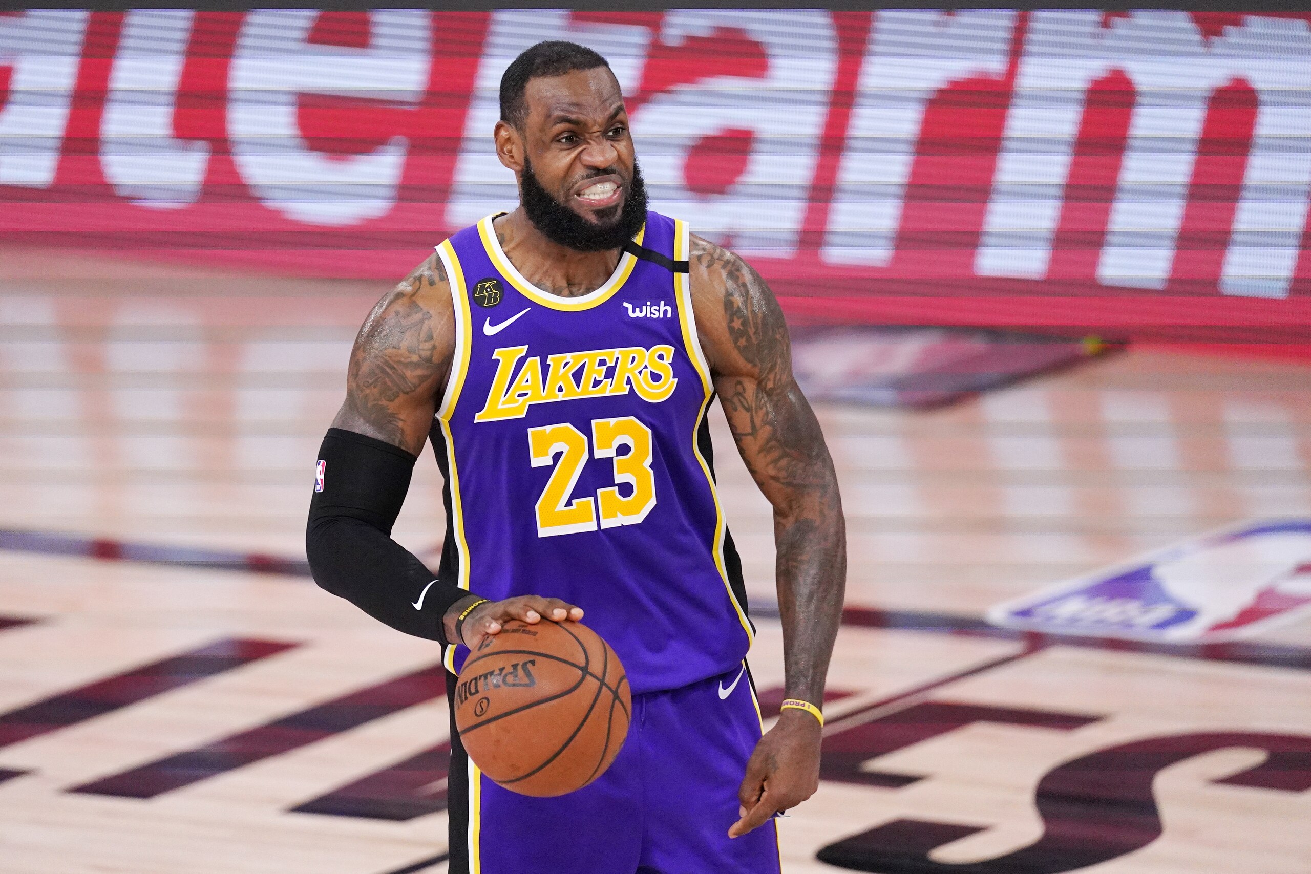 Los Angeles Lakers' LeBron James directs a play against the Denver Nuggets during the second half of an NBA conference final playoff basketball game Saturday, Sept. 26, 2020, in Lake Buena Vista, Fla. (AP Photo/Mark J. Terrill) Los Angeles Lakers' LeBron James directs a play against the Denver Nuggets during the second half of an NBA conference final playoff basketball game Saturday, Sept. 26, 2020, in Lake Buena Vista, Fla. (AP Photo/Mark J. Terrill)