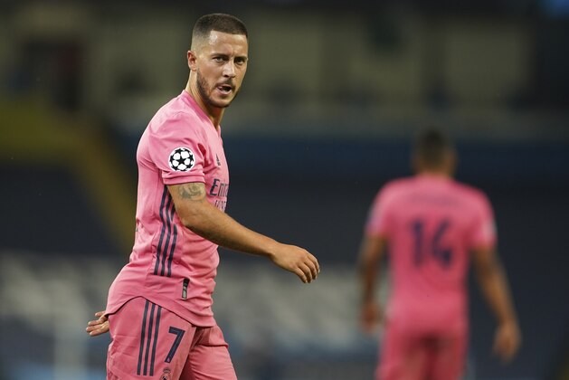 Real Madrid's Eden Hazard looks on during the Champions League round of 16, second leg soccer match between Manchester City and Real Madrid at the Etihad Stadium in Manchester, England, Friday, Aug. 7, 2020. (AP Photo/Dave Thompson, Pool)
