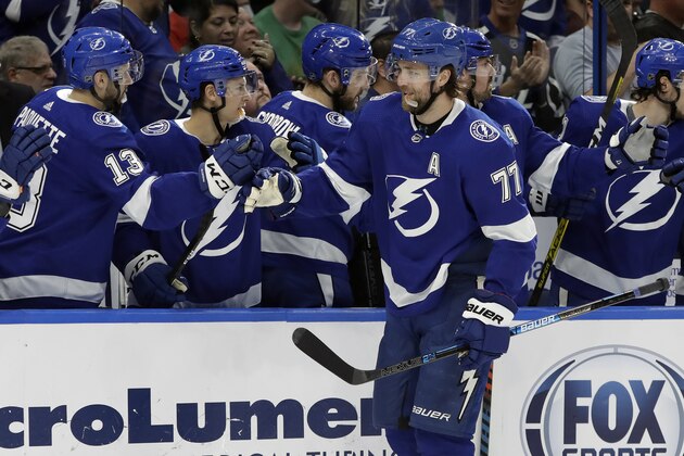 Tampa Bay Lightning defenseman Victor Hedman (77) celebrates with the bench after scoring against the Montreal Canadiens during the first period of an NHL hockey game Thursday, March 5, 2020, in Tampa, Fla. (AP Photo/Chris O'Meara) Tampa Bay Lightning defenseman Victor Hedman (77) celebrates with the bench after scoring against the Montreal Canadiens during the first period of an NHL hockey game Thursday, March 5, 2020, in Tampa, Fla. (AP Photo/Chris O'Meara)